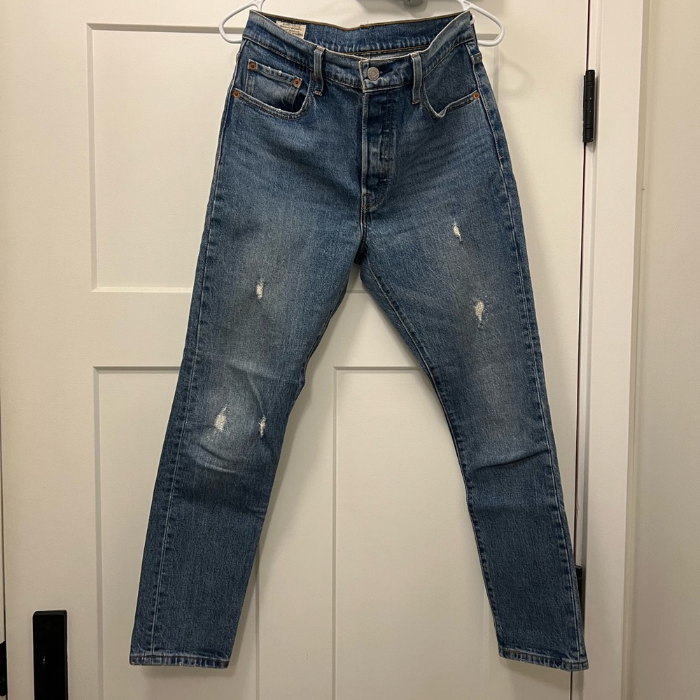 Distressed Levi’s in really good condition. They’re W28L28 and mom style jeans.